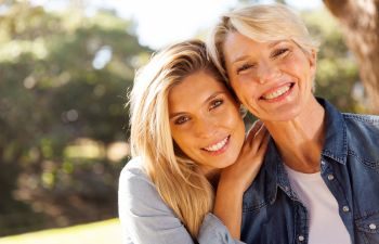 Smiling Mother and Daughter